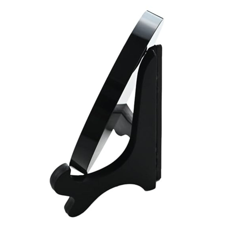 Side angle of the Obsidian Mirror - Mystic Mirror (3.15 in) displayed on its wooden stand, ideal for spiritual practice